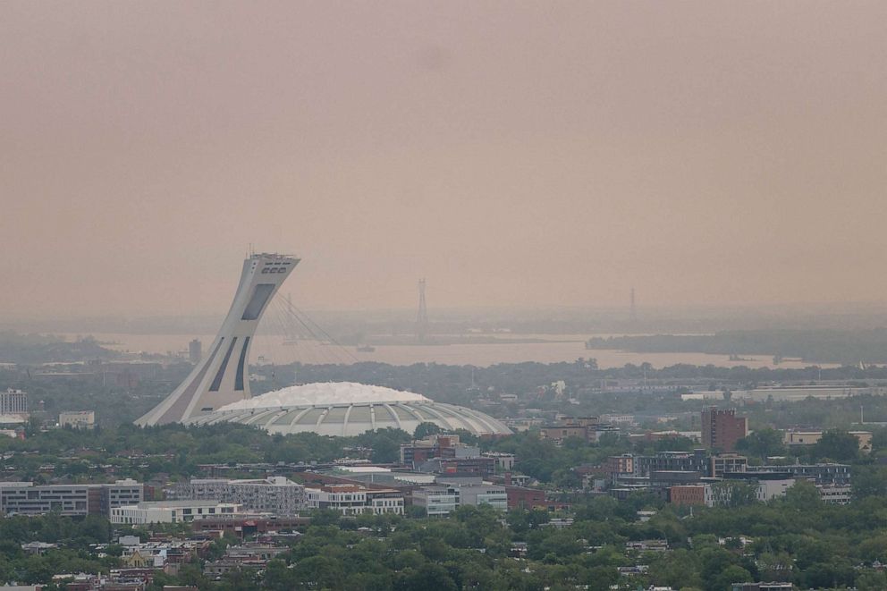 PHOTO: The Olympic Stadium as Montreal is enveloped in smog, June 6, 2023, in Montreal, Canada.