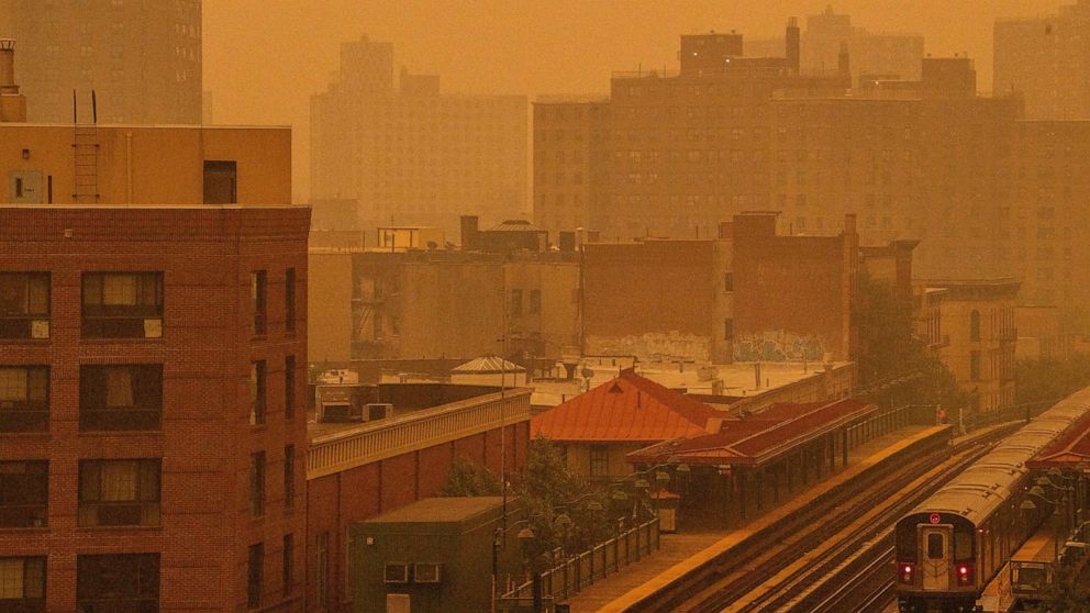PHOTO: A smoky haze from wildfires in Canada blankets a neighborhood, June 7, 2023, in the Bronx, New York.