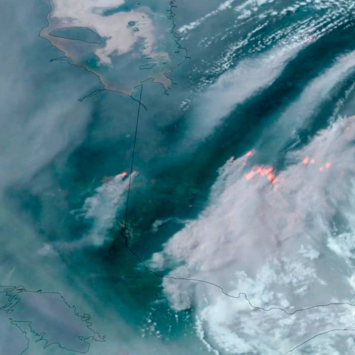 Smoke rises from fires in Quebec and Ontario in a satellite image