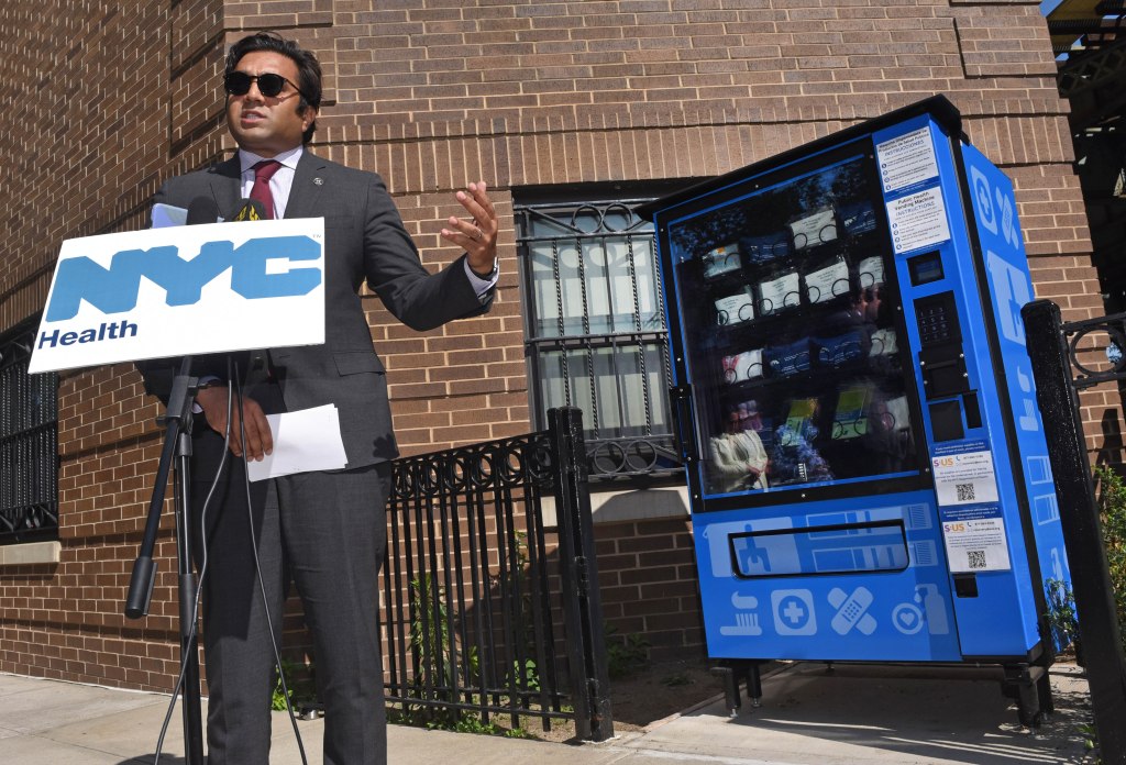 City Health Commissioner Ashwin Vasan unveils new drug vending machine. 